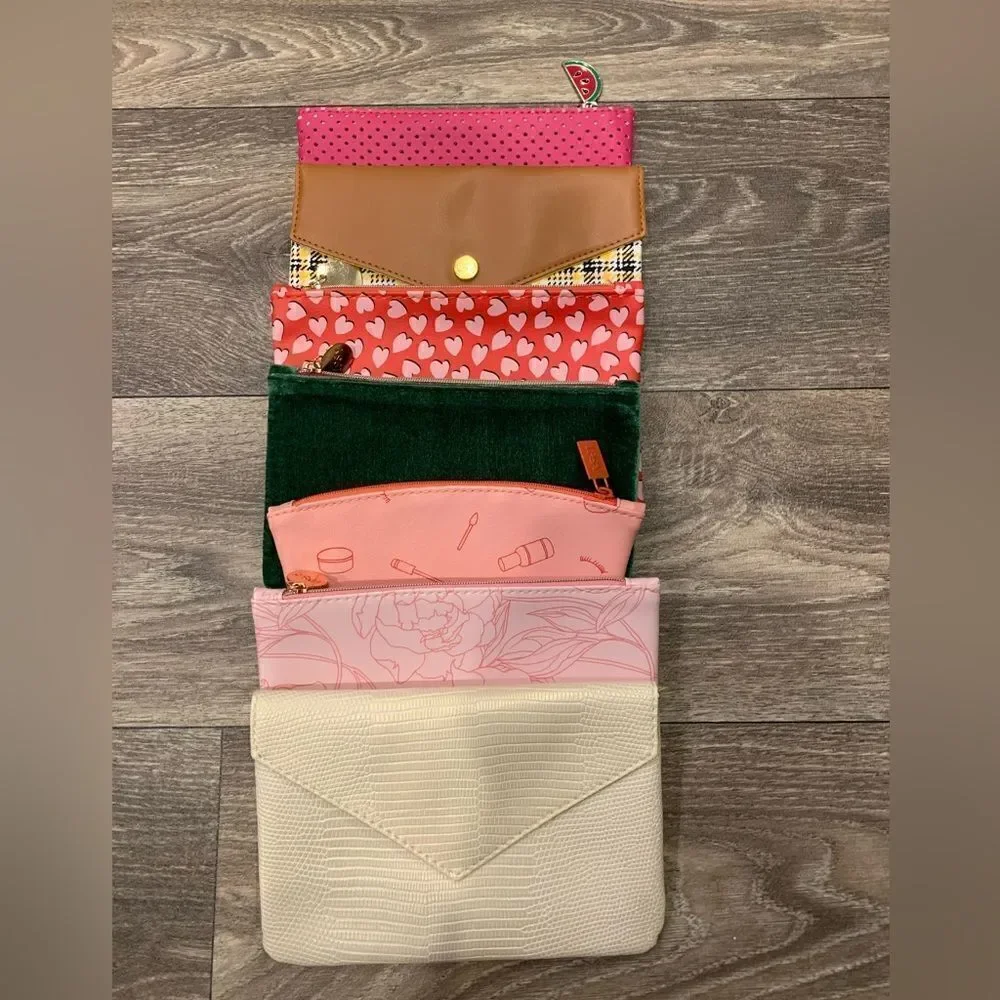 Ipsy cosmetic bags.  Lot of 7.  Clean, like new.